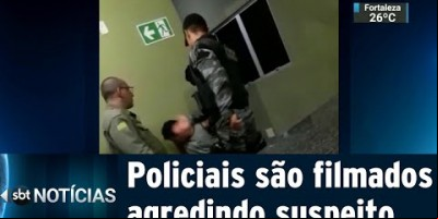 Policiais são flagrados agredindo suspeito algemado em delegacia | SBT Notícias  